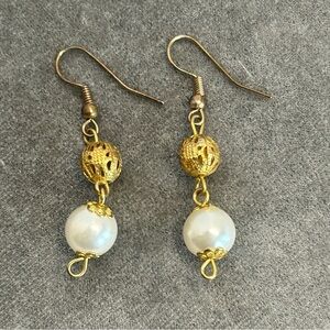Gold tone beaded faux pearl dangling earrings